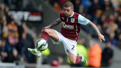 Burnley defender Kieran Trippier jumps to control the ball during the Premier League match against Hull City at the KC Stadium in Kingston upon Hull, England on May 9, 2015. Oli Scarff / AFP