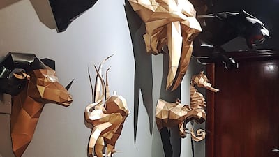 The hallway is adorned with origami-style sculptures that the Hassans made themselves using a 3D software programme. Photo by Areeb Hassan