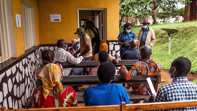 Elderly people wait to receive the first injection of Oxford/AstraZeneca Covid-19 vaccine at Muyumbu Health Center in Rwamagana, East Kigali, Rwanda. AFP