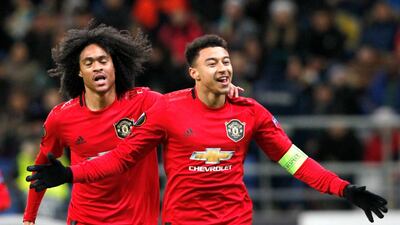 Manchester United's Jesse Lingard, right, celebrates scoring his side's opening goal during the Europa League Group L match against Astana on Thursday. AP