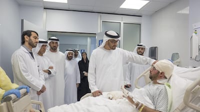 Sheikh Mohammed bin Zayed, Crown Prince of Abu Dhabi and Deputy Supreme Commander of the Armed Forces, visits UAE diplomat Mubarak Al Saedi at Mafraq Hospital. Mohamed Al Hammadi / Crown Prince’s Court Abu Dhabi