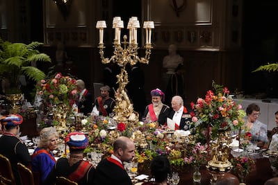 King Charles III speaks with the Oman's Sultan Haitham at the state banquet at Windsor Castle. Getty Images