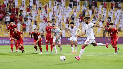 The UAE's Ali Mabkhout scores during the World Cup qualifier between the UAE and Vietnam at the Zabeel Stadium, Dubai. Chris Whiteoak / The National