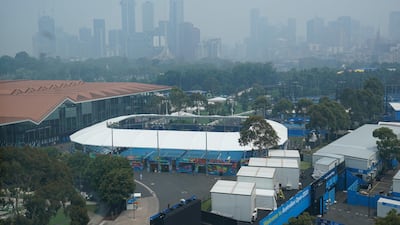 A general view of the city skyline shrouded by smoke haze from bushfires during an Australian Open practise session at Melbourne Park, on Tuesday, January 14. Reuters