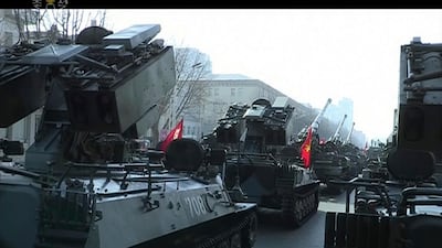 Military vehicles are seen during a parade in Pyongyang. KRT / AP