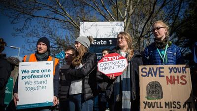 Junior doctors and supporters take part in a strike outside the Royal United Hospital in Bath, England. Matt Cardy / Getty Images