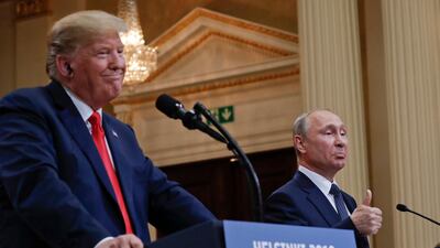 Russian President Vladimir Putin and US President Donald Trump give a joint news conference at the Presidential Palace in Helsinki, Finland, on Monday, July 16, 2018. Pablo Martinez Monsivais / AP