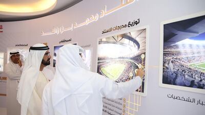 Sheikh Mohammed bin Rashid, Vice President and Ruler of Dubai, inspects the design for the new Mohammed bin Rashid Stadium in Dubai. Wam
