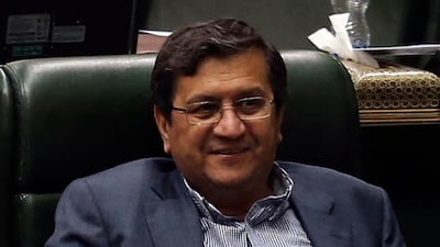 Abdolnaser Hemmati, Governor of the Central Bank of Iran, listens to a speech in parliament in Tehran. AFP