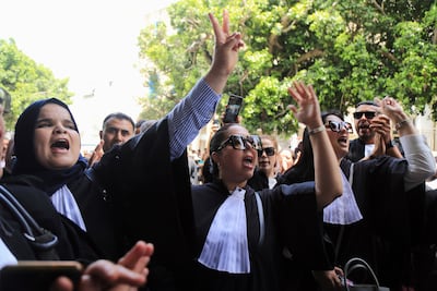 Tunisian lawyers take part in a protest against the recent arrests of their colleagues, in Tunis, Tunisia. AP Photo / Anis Mili