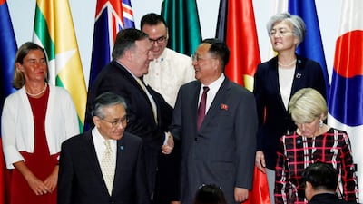US Secretary of State Mike Pompeo shakes hands with North Korea's Foreign Minister Ri Yong Ho at the Asean summit in Singapore. Reuters
