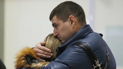Relatives react after a Russian airliner with 217 passengers and seven crew aboard crashed, as people gather at Russian airline Kogalymavia’s information desk at Pulkovo airport in St.Petersburg on October 31. Dmitry Lovetsky/AP