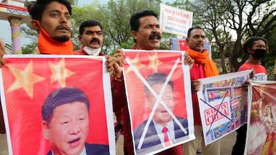 Indian protesters shout slogans as they stage a demonstration against China in Bhopal, India. EPA