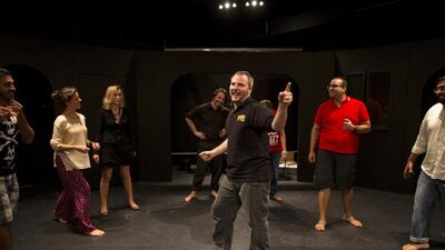 Kemsley Dickinson leads an improv workshop in the newly opened Courtyard Playhouse in Al Quoz, Dubai. Christopher Pike / The National