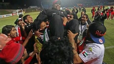 Mahdi Ali, seen here celebrating the UAE football team's Olympic qualification in Tashkent earlier this year, calls the Under 23 team 'family'. Sammy Dallal / The National