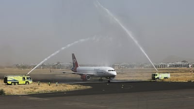 A Yemenia Airways plane is greeted with a water cannon salute at Sanaa International Airport in Yemen after the first commercial flight in six years prepares to leave the capital Sanaa. Reuters