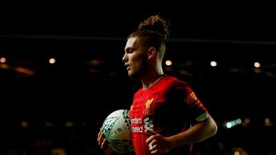 Harvey Elliott, 16, became the youngest player to start for Liverpool in a competitive match in the 2-0 win over MK Dons. EPA