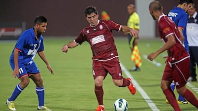 A groin injury suffered in pre-season has kept Marco Estrada, centre, out of the Al Wahda line-up. Sammy Dallal / The National