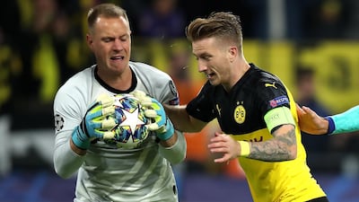 Dortmund's Marco Reus in action against Barcelona's goalkeeper Marc-Andre ter Stegen. EPA