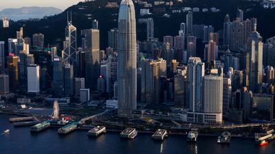 Hong Kong's skyline. Asian companies are sheltered from the rising rates that are putting pressure on green energy investments, analysts say. Reuters