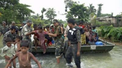 Indian army soldiers help transport children to safer areas in Madhepura district, in the northern Indian state of Bihar.