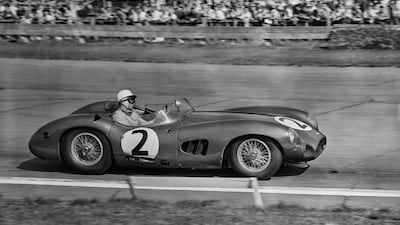 British racing driver Stirling Moss competing at Goodwood in an Aston Martin DBR1/300 in 1959