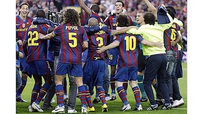 Barcelona celebrate winning the Spanish league title after victory over Valladolid.