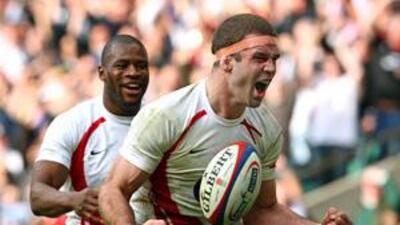 Joe Worsley reacts after scoring a try for England just before half-time.