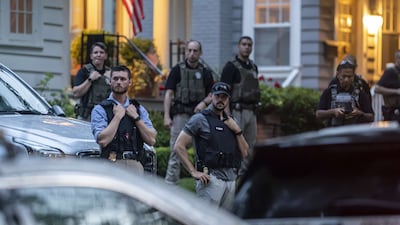 Police guard Mr Kavanaugh's home in Maryland. AFP