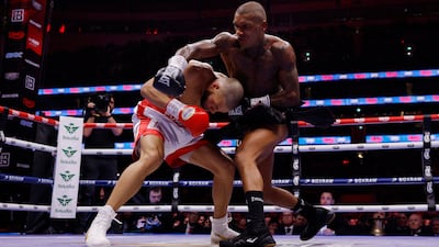 Chris Eubank Jr and Conor Benn in action. Reuters