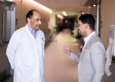 Abdullatif Alameri, who recovered from a brain injury after a crash on the Dubai-Abu Dhabi road, speaks to Dr Khalid Anwar. Reem Mohammed / The National