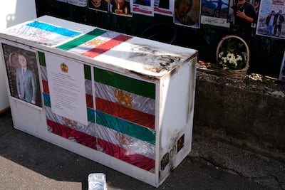 The damage to the memorial set up to commemorate protesters killed in Iran. PA