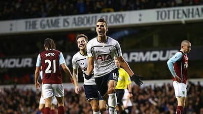 Erik Lamela of Tottenham Hotspur celebrates scoring his goal during their Premier League match against Burnley at White Hart Lane on December 20, 2014 in London, England. (Photo by Clive Rose/Getty Images)