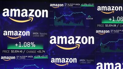 The Amazon.com logo and stock price information is seen on screens at the Nasdaq Market Site in New York. Reuters