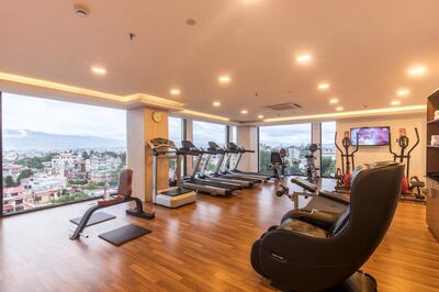 Guests running on the gym's treadmills have views overlooking the surrounding city and mountains. Courtesy Vivanta Kathmandu