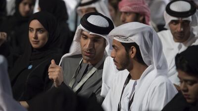 Dr Thani Al Zeyoudi, Minister for Climate Change and Environment, left, at the majlis. Hamad Al Kaabi / Crown Prince Court - Abu Dhabi