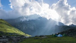 Camping tents beside Nundkol Lake at the base of Mount Harmukh in Kashmir. Getty Images