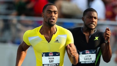 Tyson Gay, left, leads Justin Gatlin as they compete in the semi-final of the men's 100 metres on Day 2 of the 2013 USA Outdoor Track & Field Championships at Drake Stadium on June 21, 2013 in Des Moines, Iowa. Christian Petersen / Getty Images
