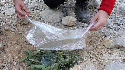 During the course, participants learn to make a pit to collect water. Pawan Singh / The National