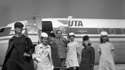 Pierre Cardin presents the new uniforms of Union de Transports Aeriens flight attendants at Paris–Le Bourget Airport in May 1968. AFP