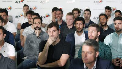 Real Madrid players Iker Casillas, centre, and Sergio Ramos, second right, Valencia midfielder Dani Parejo, centre right, and Atletico Madrid defender Juafran, left, during a press conference held by the Spanish Soccer players Association in Madrid. Victor Lerena / EPA