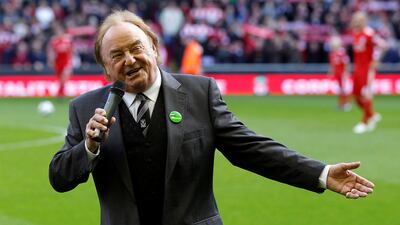 Liverpool supporter and singer Gerry Marsden sings 'You'll Never Walk Alone' before the club's English Premier League match against Blackburn Rovers at Anfield in Liverpool, in 2010. Reuters