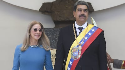 Venezuela's President Nicolas Maduro with his wife Cilia Flores. Vice president Delcy Rodriguez said the government did not know Mr Maduro's whereabouts. Getty Images