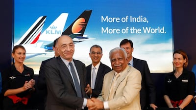 Jean-Marc Janaillac (L), the chief executive of Air France-KLM and chairman of Air France shakes hand with Naresh Goyal, the chairman of Jet Airways. Danish Siddiqui / Reuters