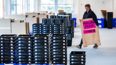 Ballot boxes and signs are sent to polling stations in Edinburgh. PA
