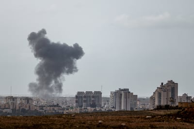 Smoke rises after an Iranian missile strike on southern Israel. Reuters