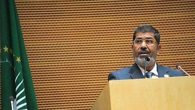 Egypt's president Mohamed Morsi addresses officials and heads of states during his milestone visit to Addis Ababa. His predecessor, Hosni Mubarak, had refused to return there after narrowly escaping an assassination attempt in 1995.