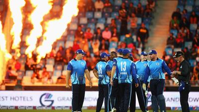 DUBAI, UNITED ARAB EMIRATES - JANUARY 29: Fidel Edwards of Leo Lions celebrates taking the wicket of Paul Collingwood of Capricorn Commanders with team mates during the Oxigen Masters Champions League 2016 match between Capricorn Commanders and Leo Lions at Dubai International Cricket Stadium on January 29, 2016 in Dubai, United Arab Emirates. (Photo by Francois Nel/Getty Images)