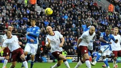 Wigan Athletic’s Hugo Rodallega, second right, fires in a shot at the death that sailed narrowly over the Aston Villa crossbar in yesterday’s 0-0 draw at the DW Stadium.