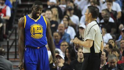 Draymond Green of the Golden State Warriors has some words with referee Scott Foster after he was called for a blocking foul during the first quarter of Game 4 of the Western Conference semi-finals against the Portland Trail Blazers during the 2016 NBA Play-offs at the Moda Center on May 9, 2016 in Portland, Oregon. Steve Dykes/Getty Images/AFP